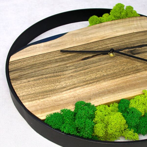 Resin wall clock made of walnut wood and with an accent of blue epoxy